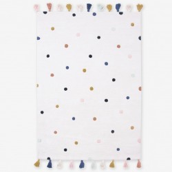 Tapis à pois et pompons